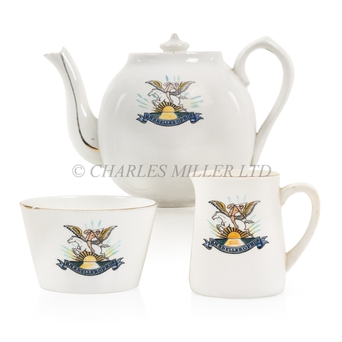 284 - H.M.S. BELLEROPHON SOUVENIR TEA SET, CIRCA 1918
made by Carlton Ware, comprising a teapot, sugar bow... 