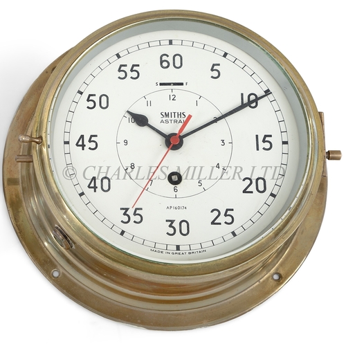 341 - AN ADMIRALTY PATTERN SHIP'S CLOCK FOR THE ROYAL NAVY BY SMITHS, CIRCA 1960
with 8in. painted dial si... 