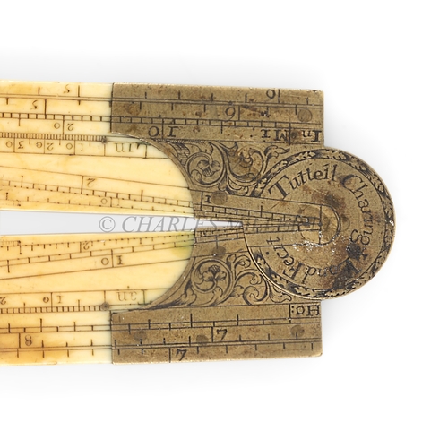 355 - Ø A RARE BRASS-MOUNTED IVORY FOLDING SECTOR BY THOMAS TUTTELL (FL. 1695-1702)
signed on the foliate ... 