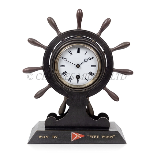 66 - AN EDWARDIAN MARINE-THEMED MANTLE CLOCK YACHTING PRIZE
constructed in brass, with 3½in. white porcel... 