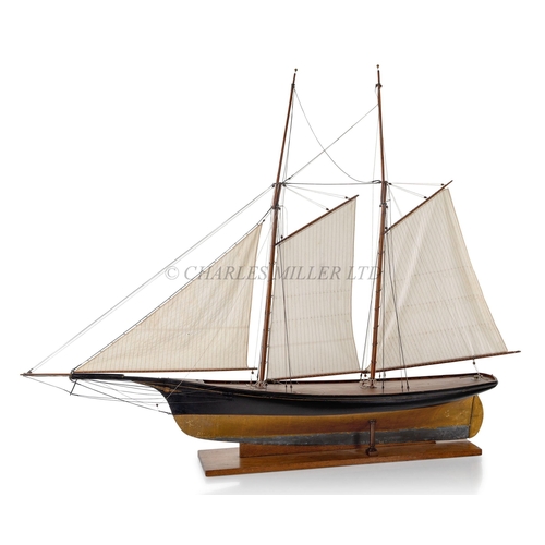 61 - A FINE AND ORIGINAL POND MODEL FOR THE CUTTER YACHT STELLA, CIRCA 1860
a 43in. hull carved from the ... 