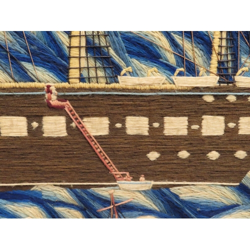 265 - A SAILOR'S WOOLWORK PICTURE, CIRCA 1870
depicting sail/steam ships of the Royal Navy in the Solent o... 