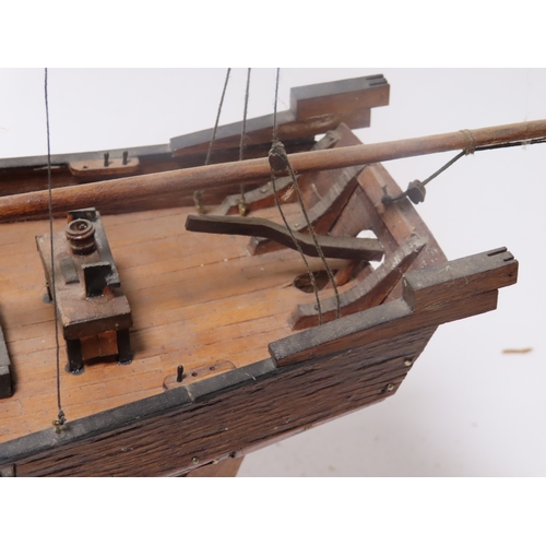 224 - A 1:32 SCALE SHIP MODEL OF H.M. SCHOONER PICKLE [1800]
with 24in. planked and pinned hull, planked d... 