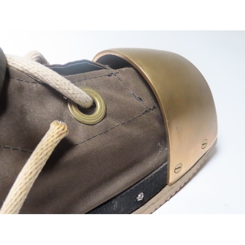 303 - AN UNUSED PAIR OF LIGHTWEIGHT DIVER'S SAND BOOTS BY DESCO
with brass soles and toecaps, canvas topsi... 