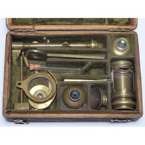 360 - A POCKET MICROSCOPE COMPENDIUM BY DOLLOND, CIRCA 1760
with screw barrel and aquatic attachments, con... 