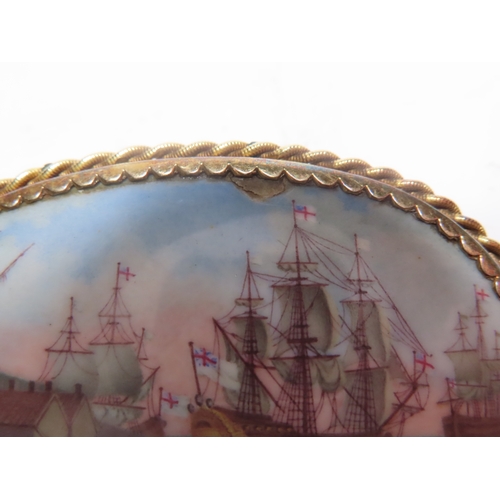 187 - A BILSTON OVAL ENAMEL PLAQUE, 18TH CENTURY
depicting ships of the line off Saint Nicholas’s Island i... 