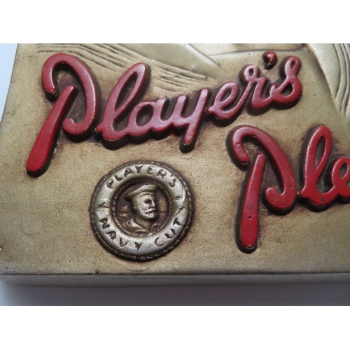 41 - A PLAYER'S PLEASE NAVY CUT TOBACCO MARKING WALL PLAQUE, CIRCA 1950
with golden repoussé sailor with ... 