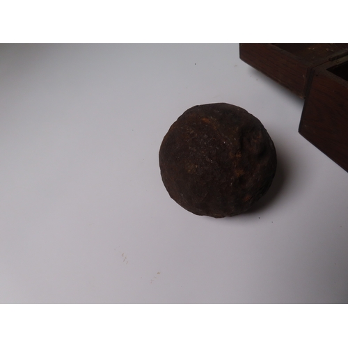 42 - CANNON BALL UNDERSTOOD TO BE FROM THE WRECK OF THE H.C.S. ADMIRAL GARDINER, 1809
the 3½in. diameter ... 