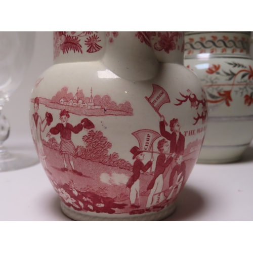 74 - A SMALL SUNDERLAND LUSTREWARE JUG
with compass device and poem; together with a red transfer print j... 