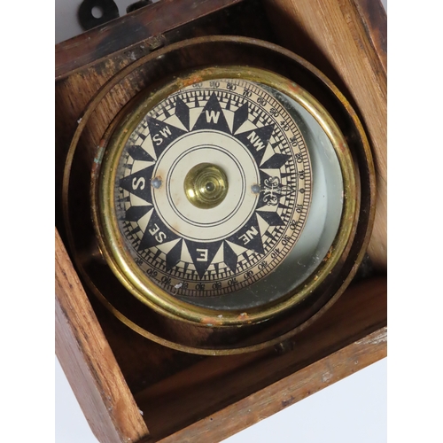 83 - 19TH CENTURY COMPASS CARD IN GIMBAL
a 2¾in. compass card contained within a gimbal mount attached to... 