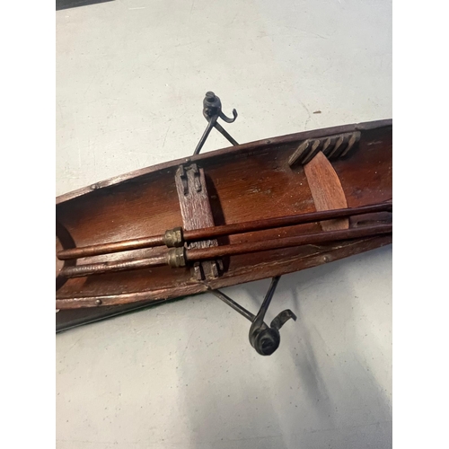 15 - A 19TH CENTURY MODEL FOR A SINGLE PERSON THAMES ROWING SKIFF
the 18in. hull carved from the solid, p... 