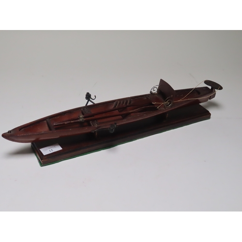 15 - A 19TH CENTURY MODEL FOR A SINGLE PERSON THAMES ROWING SKIFF
the 18in. hull carved from the solid, p... 