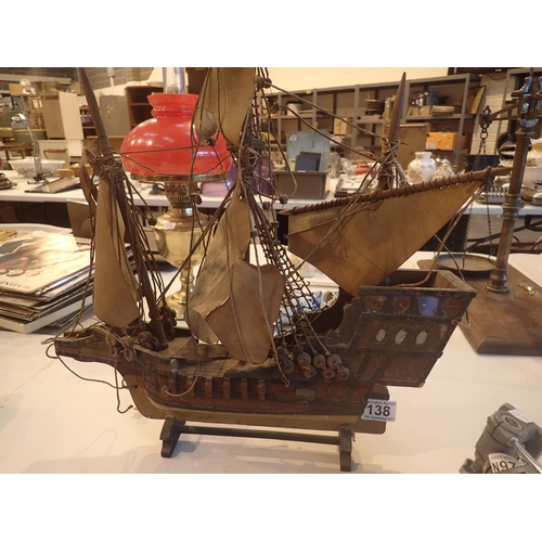 138 - Wooden model of a galleon in sail