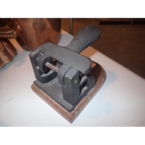 182 - Vintage iron and wood desktop two hole punch