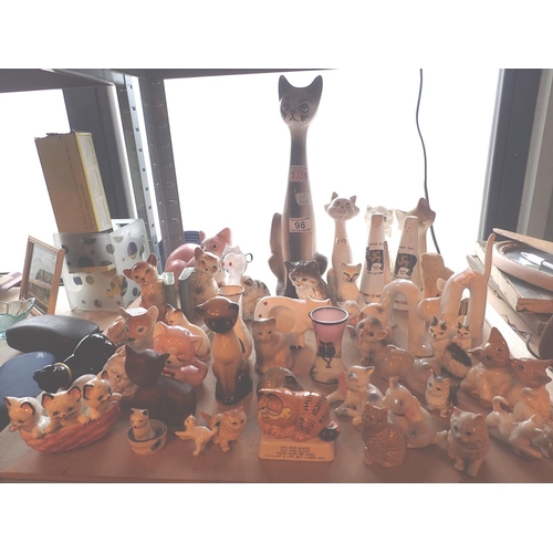 98 - Collection of cats, mostly ceramic, salt and pepper manx cats, Garfield etc