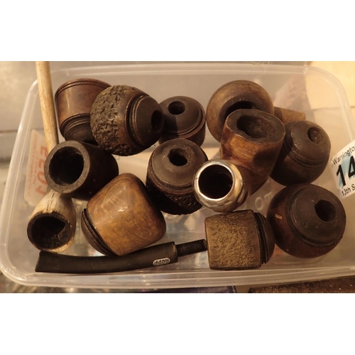 111 - Eleven pipe bowls including Petersen and a clay pipe