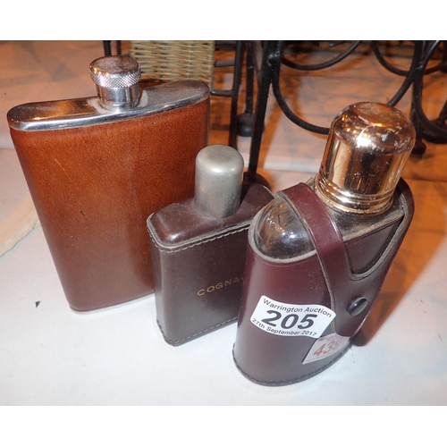 205 - Three leather cased hipflasks