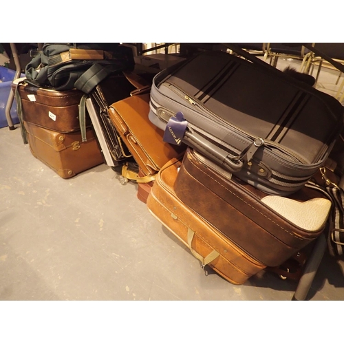 225 - Large collection of mixed suitcases and briefcases