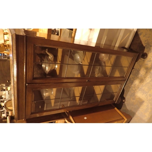 717 - Oak display cabinet with lead glass doors and contents (no key)