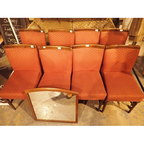 775 - Eight red upholstered restaurant chairs