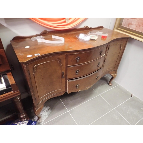 794 - Oak 1940s sideboard with three central drawers and end cupboards