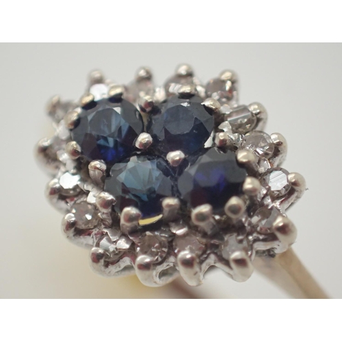 1033 - 9ct gold fancy sapphire and diamond cluster ring size P/Q