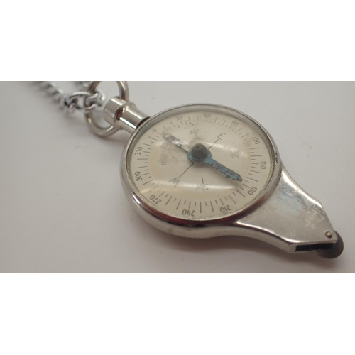 1092 - Compass and measure on a white metal chain