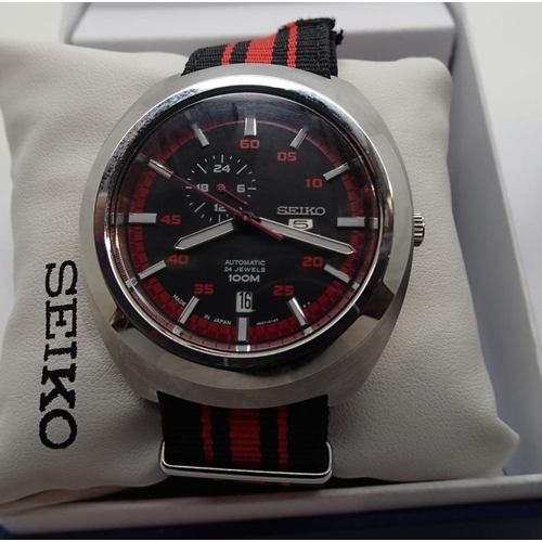 1121 - Seiko 5 Sports automatic gents wristwatch with NATO strap, boxed with instructions.
Condition Report... 