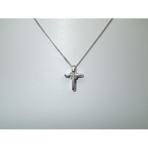 18 - 18ct white gold solid Princess cut diamond set cross on 18ct white gold necklace, approximately 0.25... 