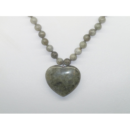 201 - Jade type hardstone bead necklace with a large heart shaped pendant with a sterling silver clasp, L:... 