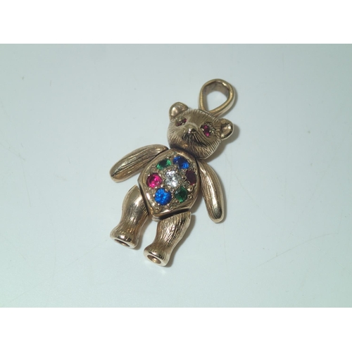 217 - 9ct gold articulated stone set teddy bear pendant, H: 25 mm, 8.2g
P&P group 1 (£16 for the first ite... 