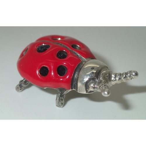67 - Sterling silver enamelled ladybird form pin cushion L: 18 mm
P&P group 1 (£16 for the first item and... 