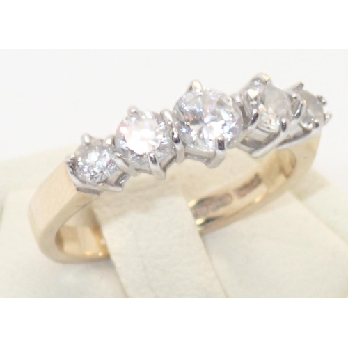 70 - 9ct gold five stone dress ring, size M, 3.3g
P&P group 1 (£16 for the first item and £1.50 for subse... 