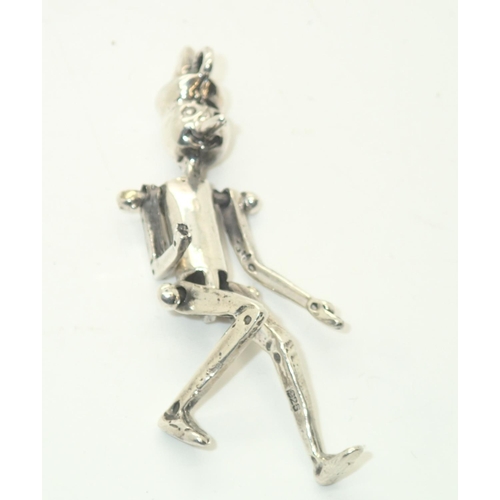 75 - Sterling silver articulated tin man pendant, H: 50 mm, 9.0g
P&P group 1 (£16 for the first item and ... 