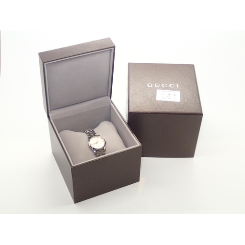 243 - Ladies stainless steel Gucci Timeless wristwatch with box, papers, and spare links RRP £590.00 
P&P ... 