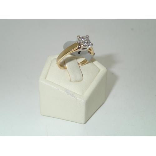 144A - Ladies 18ct gold, four stone princess cut diamond ring, approximately 50 points, 1/2ct Size K 3.1g
P... 