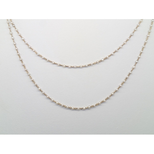 110 - Vintage yellow metal and seed pearl two-strand necklace L: 85 cm
P&P group 1 (£16 for the first item... 