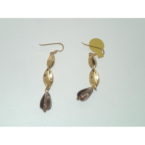 135 - Fancy gold plated drop earrings 
P&P group 1 (£16 for the first item and £1.50 for subsequent items)