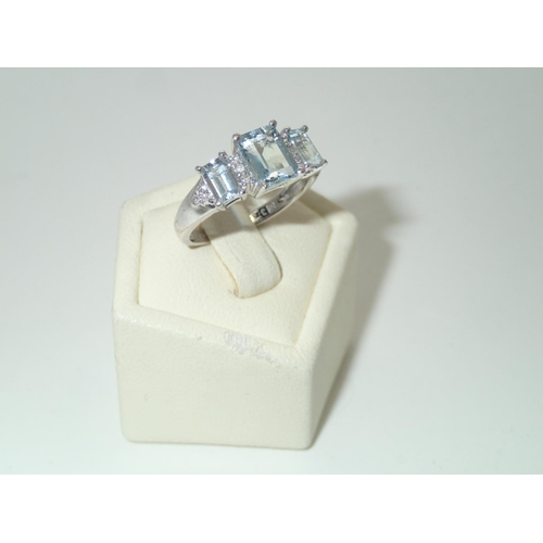 136 - 9ct white gold aquamarine and diamond dress ring, size I/J, 2.5gCentre stone 7 x5 mm smaller stones ... 