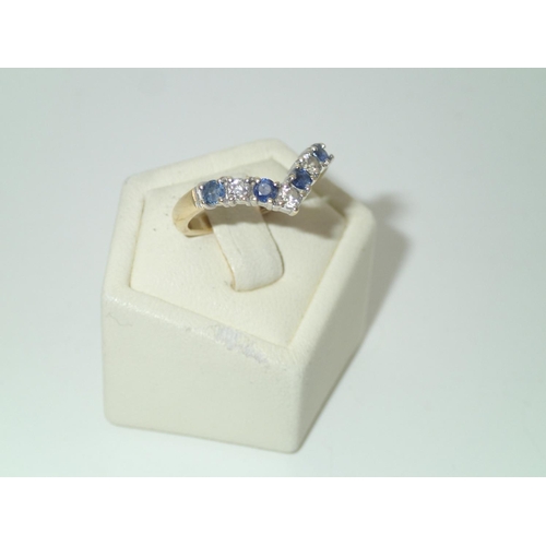 162 - 18ct gold diamond & sapphire wishbone ring, size L, 2.9g
P&P group 1 (£16 for the first item and £1.... 
