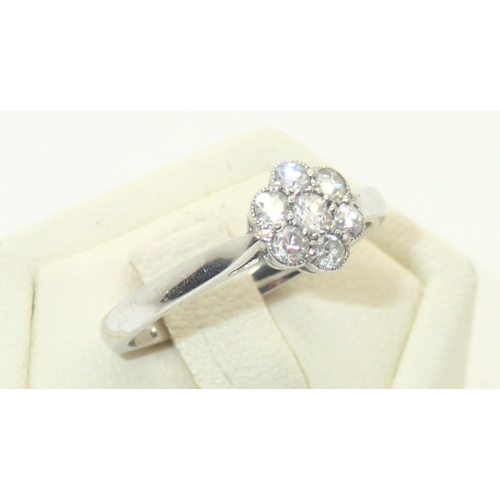 82 - 18ct white gold diamond flower head cluster ring, size K, 2.5g Shank marked total carat weight 0.33 ... 