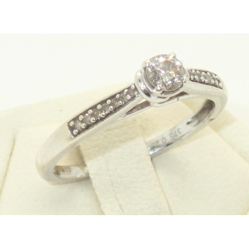 84 - 9ct white gold diamond engagement ring, with diamond shoulders, size M, 1.8g
P&P group 1 (£16 for th... 