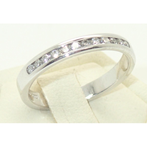 88 - Contemporary 18ct white gold diamond half-eternity ring, size L, 2.9g
P&P group 1 (£16 for the first... 
