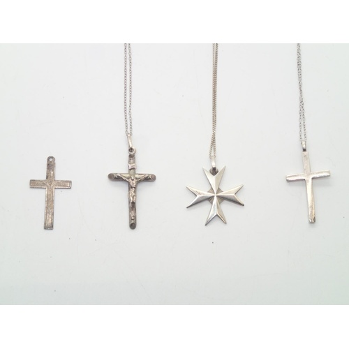 89 - Four silver crosses on three silver chains
P&P group 1 (£16 for the first item and £1.50 for subsequ... 