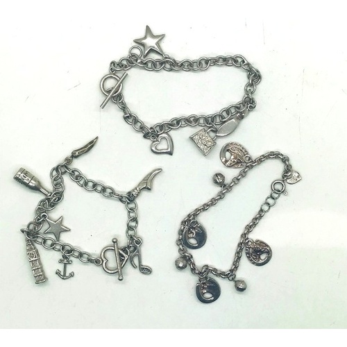81 - Three silver charm bracelets, total weight 50.0g
P&P group 1 (£16 for the first item and £1.50 for s... 