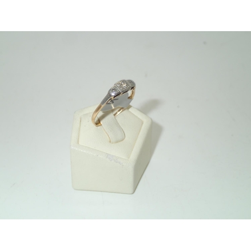 107A - 18ct gold and platinum three stone diamond antique ring Size Q 2.0g
P&P group 1 (£16 for the first i... 