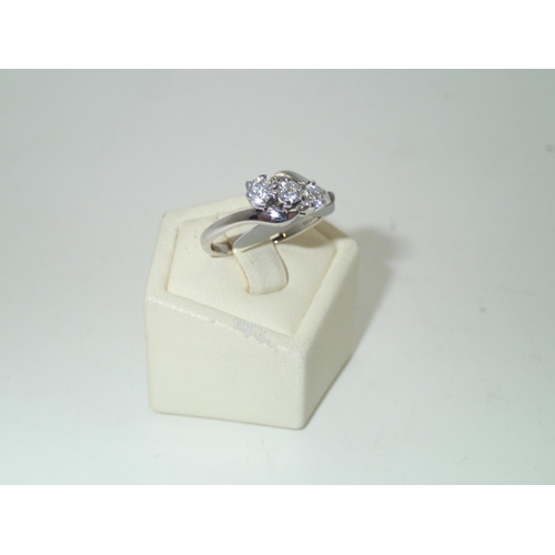 158A - 18ct white gold three stone on a twist, 1/2ct best quality diamond ring Size O 4.0g
 P&P group 1 (£1... 
