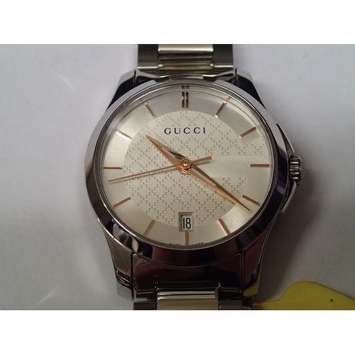 243 - Ladies stainless steel Gucci Timeless wristwatch with box, papers, and spare links RRP £590.00 
P&P ... 