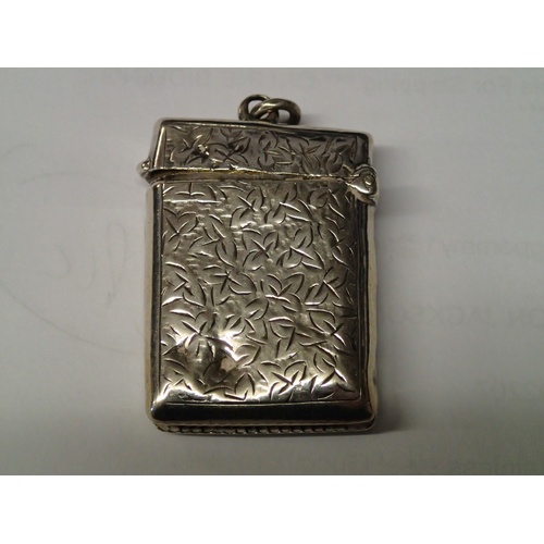 59 - Hallmarked silver with gold panels vesta case. Gold panels are hallmarked. Couple of dints to back a... 