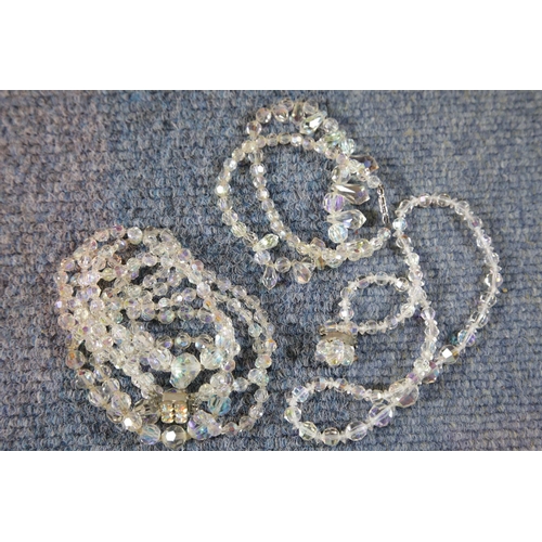 119 - Two strand crystal necklaces and two single strand crystal necklaces. P&P Group 1 (£14+VAT for the f... 